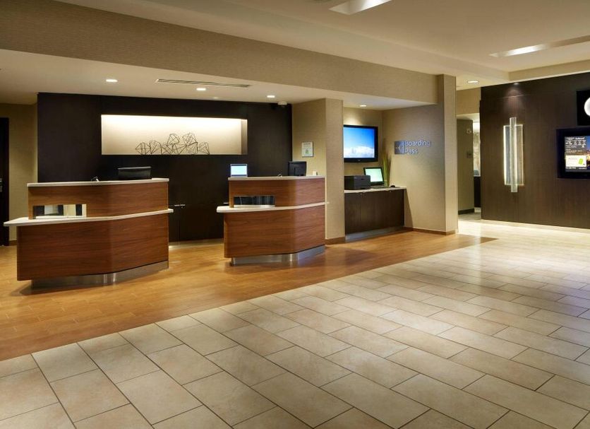 Courtyard by Marriott Pittsburgh Airport Settlers Ridge lobby with front desk and seating area in Pittsburgh