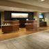 Courtyard by Marriott Pittsburgh Airport Settlers Ridge lobby with front desk and seating area in Pittsburgh