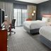 Courtyard by Marriott Nashville Brentwood guest room with two queen beds and desk by window