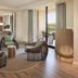 The Westin Kierland Resort & Spa in Scottsdale living area with wicker chairs, TV, and balcony view