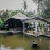 Fullmoon Villa Ubud in Ubud with a tropical garden pond, covered pavilion, and villa pathways