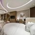 Golden Eagle Summit Hotel Kunshan in Suzhou: luxurious suite with freestanding tub and modern seating area
