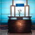 Pulse Grande Hotel, Putrajaya lobby with central reception desk and turquoise glass walls