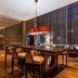 JW Marriott Hotel Bogota in Bogotá lounge with high-top table, pendant lights, seating, and city-view windows