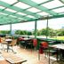 Landvetter Airport Hotel, BW Premier Collection terrace dining area with green glass roof and outdoor seating