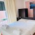 L'Affittacamere di Venezia room with double bed, balcony door, and bedside tables in Venice