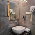 Grand Legacy Beacon, Dehradun bathroom with vessel sink, mirror, wall hair dryer and towel rack