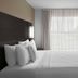 Residence Inn by Marriott Fort Worth Cultural District guest room with king bed and large window