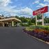 Red Roof Inn Birmingham South in Birmingham exterior with covered entrance and landscaped driveway