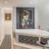 Hotel Murtenhof & Krone spa with sauna, soaking tub and patterned tile in Murten