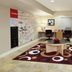 TownePlace Suites by Marriott San Jose Campbell lobby with seating area, workstations and map wall