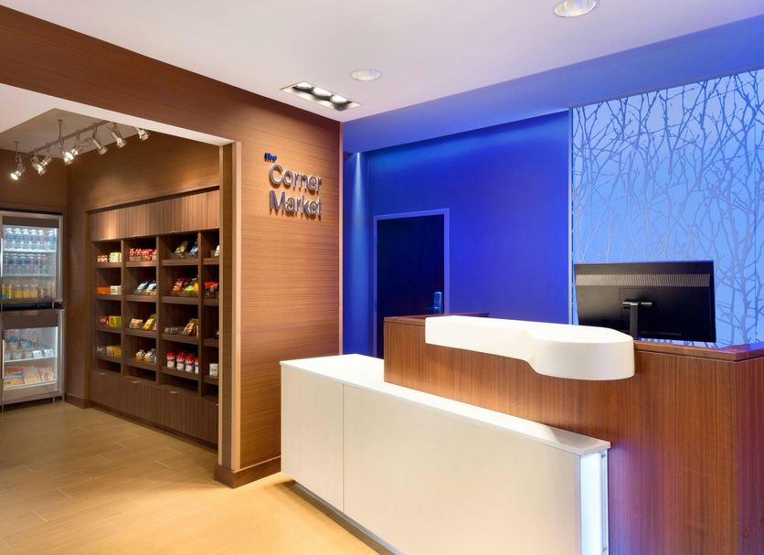 Fairfield Inn & Suites by Marriott Lancaster East at The Outlets lobby front desk and snack market