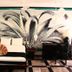 Hotel Maya del Mar Playa del Carmen room with palm mural, bed, desk and chair