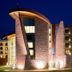 Sky Ute Casino Resort in Ignacio at night, showing a modern stone hotel exterior with illuminated windows