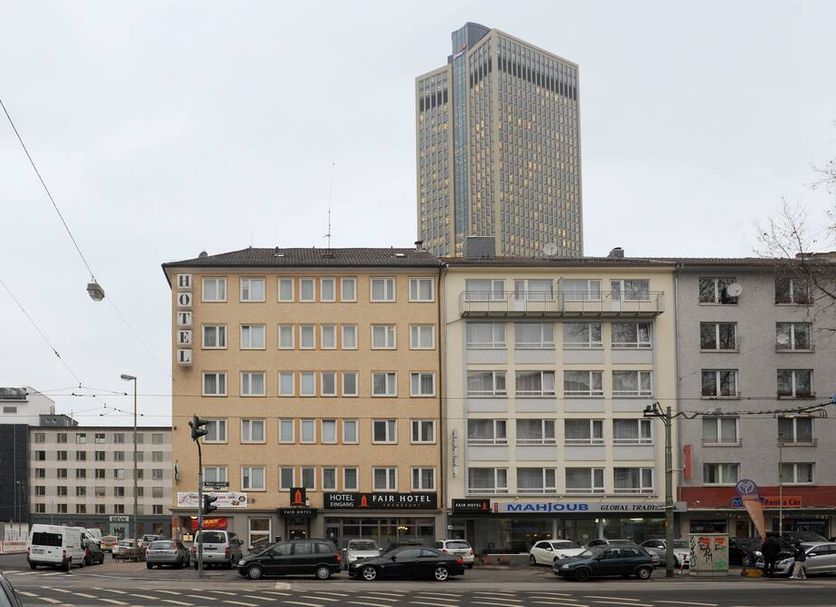 Fair Hotel Europaallee in Frankfurt am Main, street view with high-rise tower behind neighboring buildings