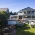 The Knysna Belle Guest House in Knysna, exterior view with balcony and landscaped garden