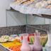 Citi Hotel Residence Caruaru breakfast buffet with assorted breads, fruit, cold cuts and juices in Caruaru