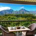 Hanalei Bay Resort in Princeville balcony with table, chairs and mountain view