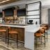 Hilton Garden Inn Topeka bar with high stools and modern counter seating in Topeka