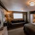 Widbrook Grange Bradford-on-Avon guest room with double bed, sofa, and window seat