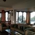 The Fort Resort Nagarkot lounge with large windows and valley views