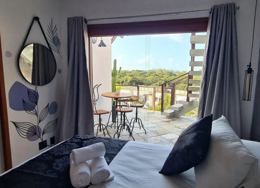 Apart Hotel Brisas do Amor, Pipa room with bed, balcony seating and ocean view