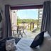 Apart Hotel Brisas do Amor, Pipa room with bed, balcony seating and ocean view