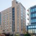Apa Hotel Tokyo Ojima in Tokyo, high-rise hotel exterior with adjacent city buildings