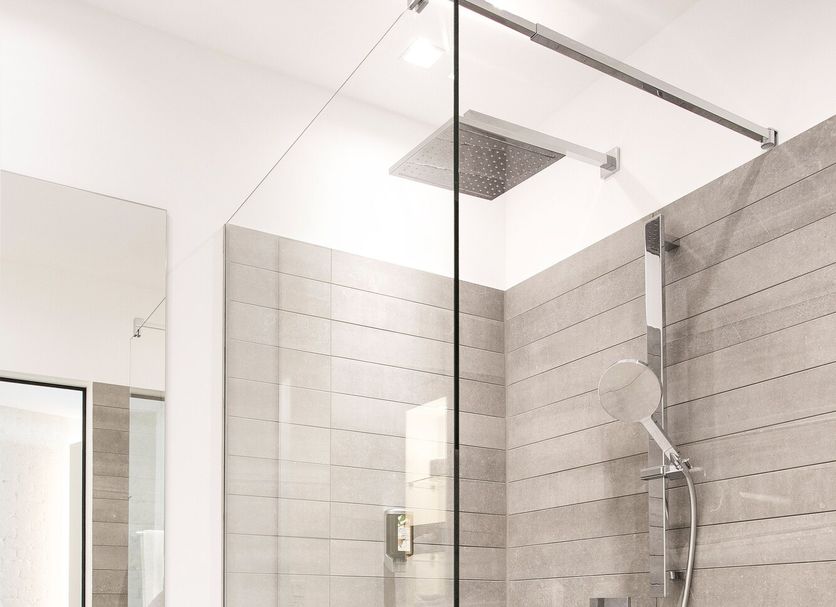1st Floor Köln 2 Cologne bathroom with glass shower, rain showerhead and white sink