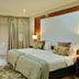 ANEW Resort White River Mbombela guest room with king bed, desk and sliding door to balcony in White River