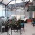 Hotel Casa Lamay in Bogotá patio lounge with cushioned seating and potted plants