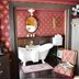 Alaska Heritage House Bed And Breakfast in Fairbanks bathroom with clawfoot tub and red patterned walls
