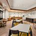 Fairfield Inn & Suites by Marriott Seattle Downtown/Seattle Center breakfast area with tables and bar seating