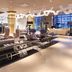 Zijin Hotel Belgrade lobby lounge with modern seating, decorative columns, and city views in Belgrade