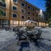 Hotel San Pancrazio in Trescore Balneario courtyard with outdoor tables and chairs
