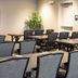 Residence Inn by Marriott Wilkes-Barre Arena meeting room with tables, chairs and wall-mounted TV