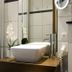 Boutique-Hotel Moseltor bathroom with vessel sink, orchid, and tiled shower in Traben-Trarbach