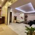 Housez 43 Kolkata lobby with reception desk, seating area, and ceiling lighting