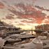 Krystal Beach Hotel in Gordon's Bay with marina, yachts, and sunset water views