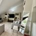 Dedeminn Marina Hotel in Göcek: bright loft lounge with sofa seating, TV, balcony, and marina views