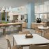 Element Sedona breakfast area with bar seating, pendant lights and modern dining tables