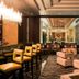 Grosvenor House, a Luxury Collection Hotel, Dubai lounge with bar seating and armchairs