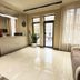 Yerevan Deluxe Hotel lobby in Yerevan with reception desk, glossy tile floor and seating area