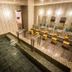 Super Hotel Inn Sendai Kokubuncho hot spring bath with tiled pool, sinks, mirrors and stools in Sendai