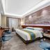 Anhui Construction New Era Hotel, Bengbu: modern guest room with king bed, TV, desk and city-view curtains