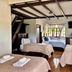 Hotel & Restaurant Fleur De Lis room in Concepción de Ataco with multiple beds and a window view