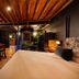 Palma Riad in Palma de Mallorca, warm boutique hotel room with wood ceiling and canopy bed