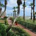 Casa Loma in Panama City Beach, palm-lined path beside the beach and ocean view