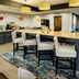 Quality Inn Danville - University Area breakfast area with island seating and lounge chairs