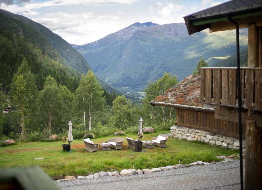 Blåtind Boutique Hotel in Stordal with mountain valley views and a garden patio